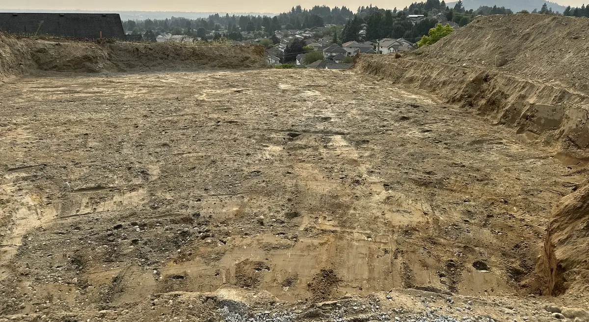 Excavated building lot, graded and ready for foundation work